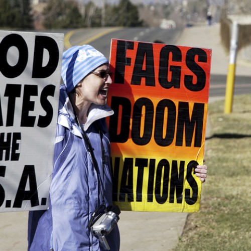 Members of Fred Phelps' movement protest in front of church in Lakewood, CO.