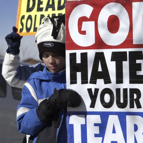 Members of Fred Phelps' movement protest in front of church in Lakewood, CO.